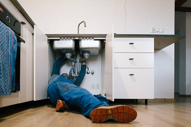 Professional Drain Cleaning technician working in Aquebogue, NY